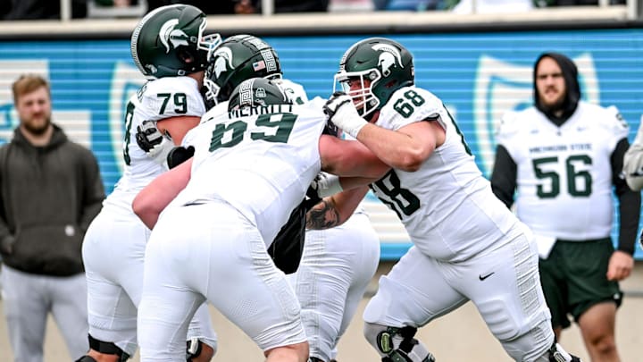 Michigan State's Jacob Merritt, left, and Gavin Broscious run a drill during the Spring Showcase on Saturday, April 20, 2024, at Spartan Stadium in East Lansing.