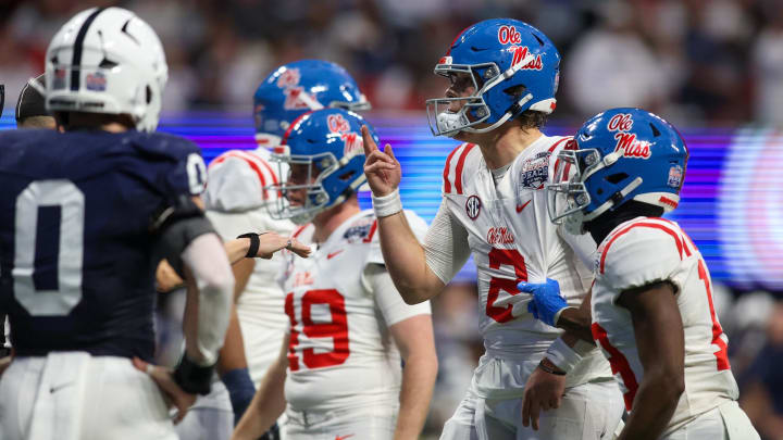 Dec 30, 2023; Atlanta, GA, USA; Mississippi Rebels quarterback Jaxson Dart (2) reacts after a touchdown against the Penn State Nittany Lions in the second half at Mercedes-Benz Stadium. Mandatory Credit: Brett Davis-USA TODAY Sports