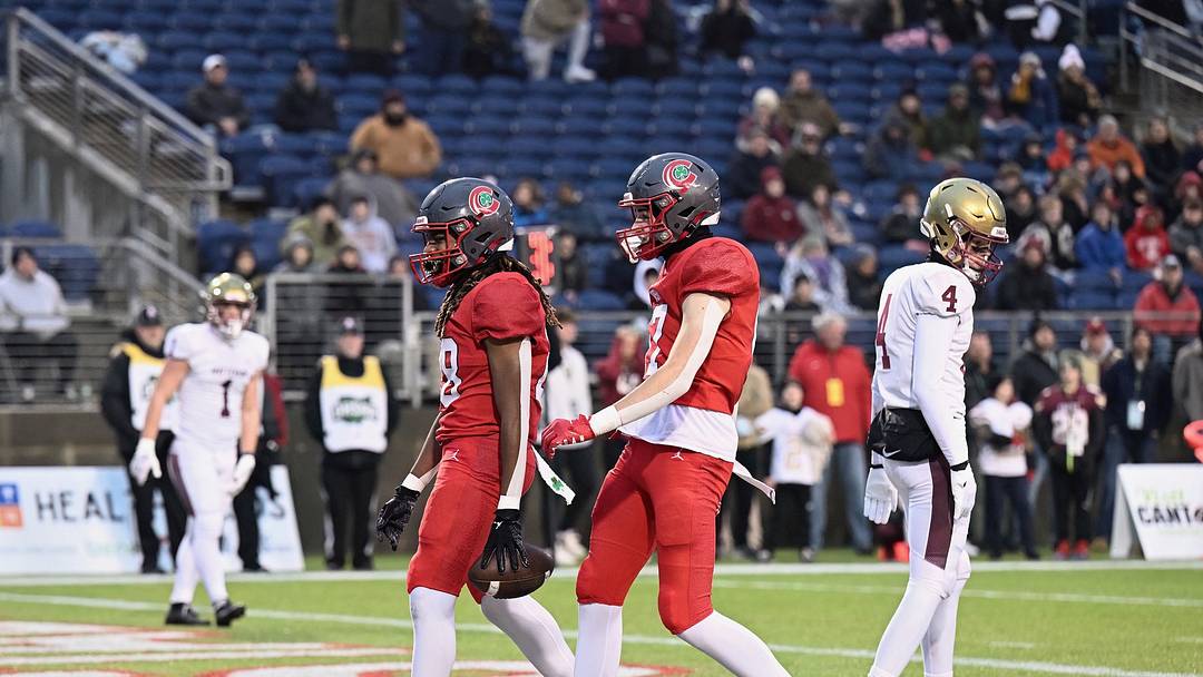Preston Fryzel (front) of Toledo Central Catholic celebrates with a teammate during the 2023 OHSAA Division I state championship game. 