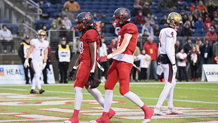 Preston Fryzel (front) of Toledo Central Catholic celebrates with a teammate during the 2023 OHSAA Division I state championship game. 