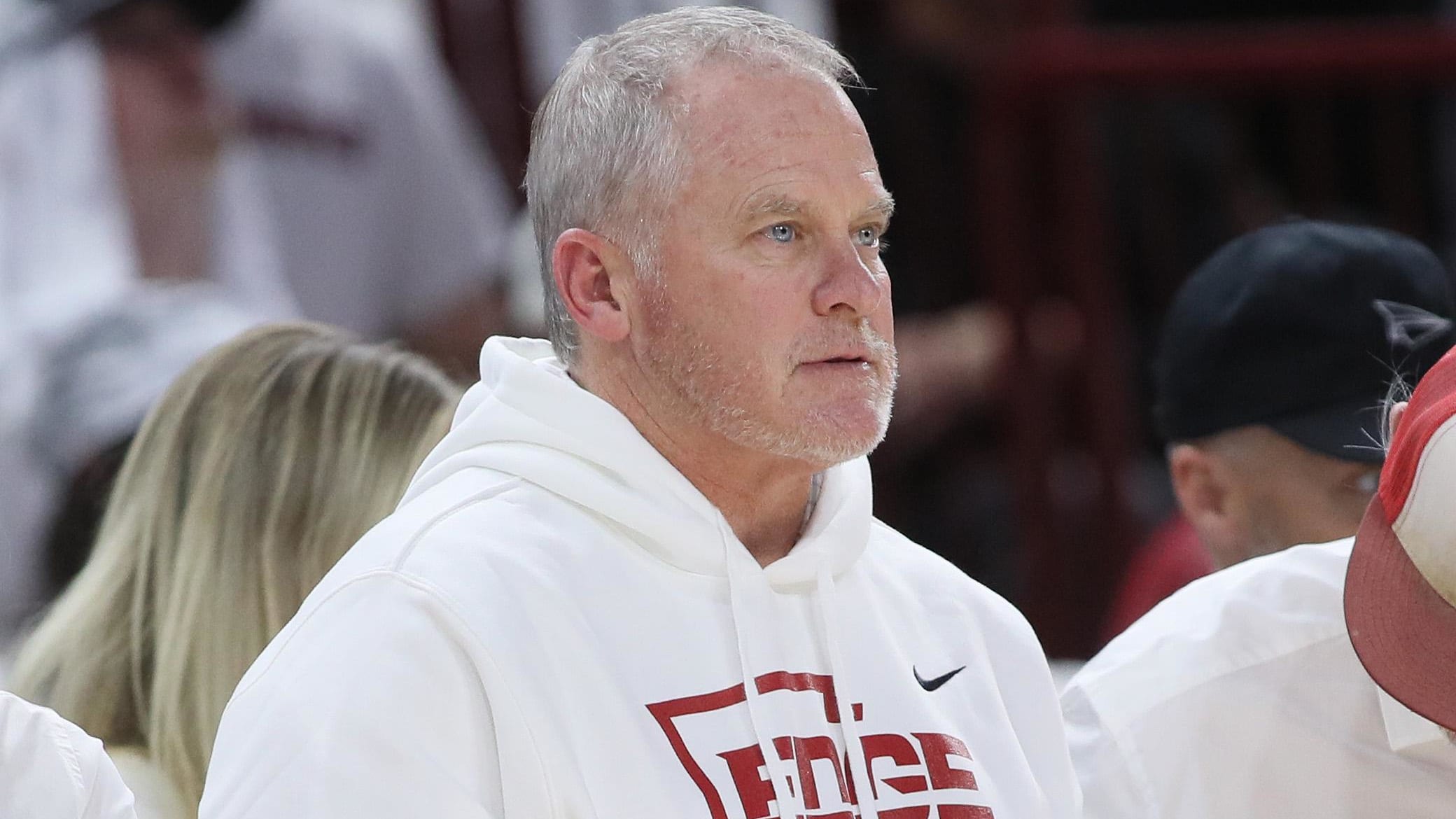 Arkansas athletics director Hunter Yurachek cheers on the Razorbacks.