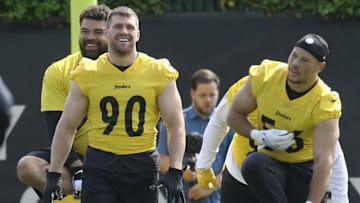 May 24, 2022; Pittsburgh, PA, USA;  Pittsburgh Steelers defensive end Cameron Hayward (rear) and linebackers  TJ Watt (90) and Alex Highsmith (56)