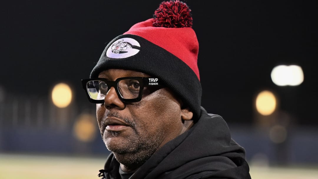 Glenville head coach Ted Ginn, Sr. looks on as the Tarblooders face Archbishop Alter in the 2023 OHSAA Division IV state championship game.