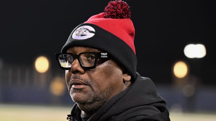 Glenville head coach Ted Ginn, Sr. looks on as the Tarblooders face Archbishop Alter in the 2023 OHSAA Division IV state championship game.