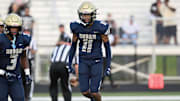 Archbishop Hoban's Elbert "Rock" Hill IV celebrates after a play against Trinity Episcopal on September 2, 2023. 