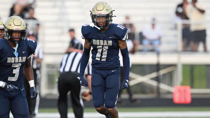 Archbishop Hoban's Elbert "Rock" Hill IV celebrates after a play against Trinity Episcopal on September 2, 2023. 