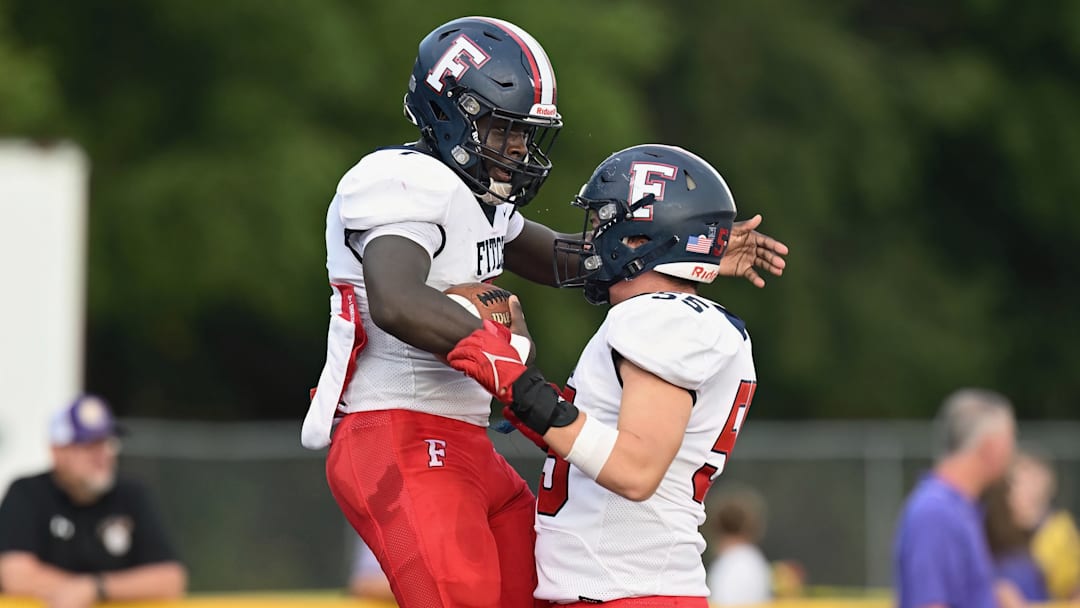 Austintown-Fitch teammates celebrate during a win over Massillon Jackson on August 30, 2023. 