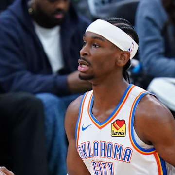 Mar 12, 2025; Boston, Massachusetts, USA; Oklahoma City Thunder guard Shai Gilgeous-Alexander (2) returns the ball against the Boston Celtics in the first quarter at TD Garden. Mandatory Credit: David Butler II-Imagn Images