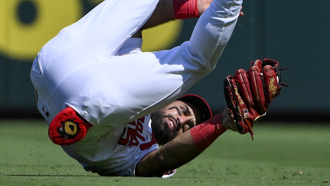 Sep 21, 2025; St. Louis, Missouri, USA; St. Louis Cardinals second baseman Jose Fermin (15) dives and catches a ball hit by Milwaukee Brewers catcher Danny Jansen (not pictured) during the second inning at Busch Stadium. Mandatory Credit: Jeff Curry-Imagn Images