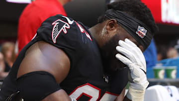 Former Atlanta Falcons defensive tackle Grady Jarrett (97) reacts after a play in the second quarter against the Seattle Seahawks at Mercedes-Benz Stadium.
