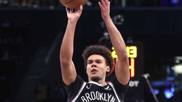 Mar 31, 2024; Brooklyn, New York, USA; Brooklyn Nets forward Cameron Johnson (2) shoots during the first half against the Los Angeles Lakers at Barclays Center. Mandatory Credit: Vincent Carchietta-USA TODAY Sports