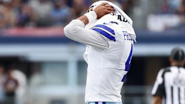 Dallas Cowboys quarterback Dak Prescott (4) reacts on the sideline during overtime against the New York Giants at AT&T Stadium.