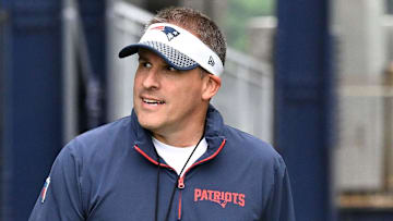 Jun 9, 2025; Foxborough, MA, USA; New England Patriots wide receiver Stefon Diggs (8) and offensive coordinator Josh McDaniels walk to the practice fields at Gillette Stadium. Mandatory Credit: Eric Canha-Imagn Images