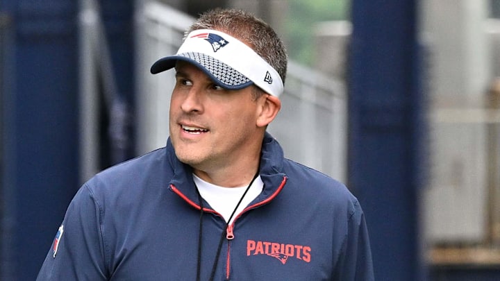 Jun 9, 2025; Foxborough, MA, USA; New England Patriots wide receiver Stefon Diggs (8) and offensive coordinator Josh McDaniels walk to the practice fields at Gillette Stadium. Mandatory Credit: Eric Canha-Imagn Images
