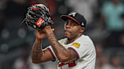 Sep 23, 2025; Cumberland, Georgia, USA; Atlanta Braves relief pitcher Raisel Iglesias (26)  reacts after the Braves defeated the Washington Nationals at Truist Park. Mandatory Credit: Dale Zanine-Imagn Images