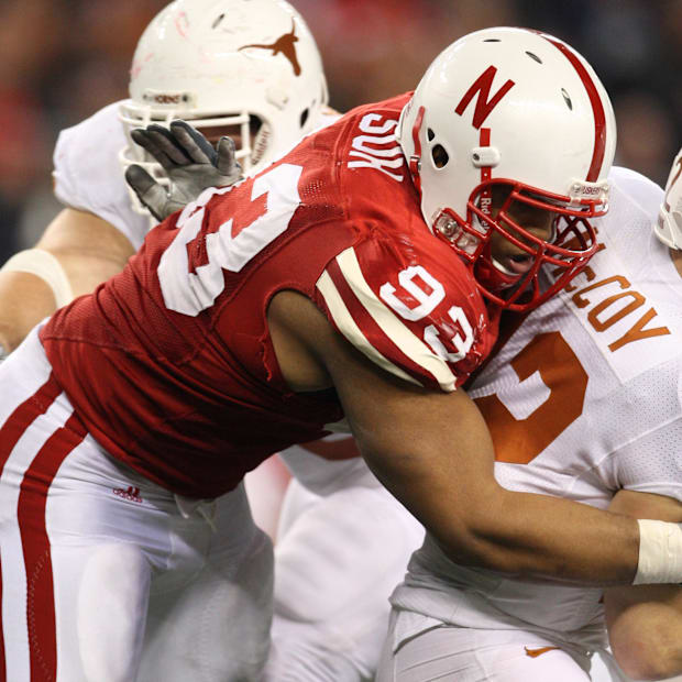 Ndamukong Suh tackles Texas quarterback Colt McCoy during the 2009 Big 12 championship game.