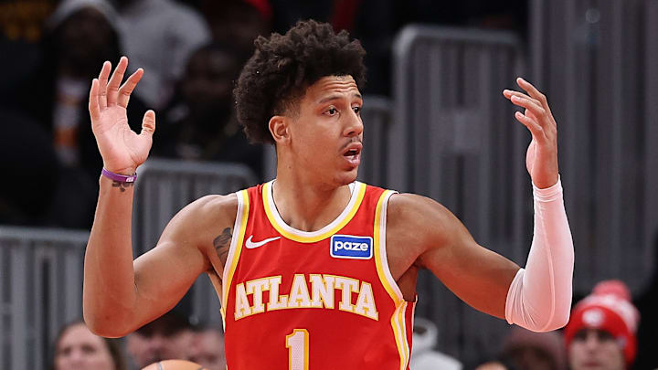 Jalen Johnson throws his hands up against the Chicago Bulls.