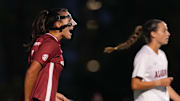 Arkansas' Bella Field celebrates after scoring a goal against Alabama. The Razorbacks won 3-1