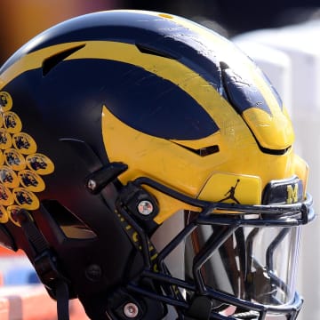 Oct 12, 2019; Champaign, IL, USA; A Michigan Wolverines helmet sits on the back of the bench during the second half of the game against the Illinois Fighting Illini at Memorial Stadium. Mandatory Credit: Michael Allio-USA TODAY Sports