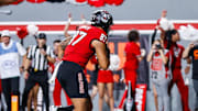 Sep 27, 2025; Raleigh, North Carolina, USA;  North Carolina State Wolfpack tight end Dante Daniels (87) makes a touchdown during the first half of the game against Virginia Tech Hokies at Carter-Finley Stadium. Mandatory Credit: Jaylynn Nash-Imagn Images