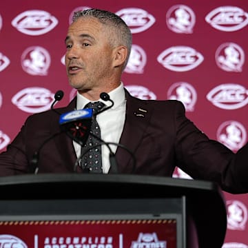 Jul 23, 2025; Charlotte, NC, USA; aFlorida State head coach Mike Norvell answers questions from the media during ACC Media days at Hilton Charlotte Uptown. Mandatory Credit: Jim Dedmon-Imagn Images