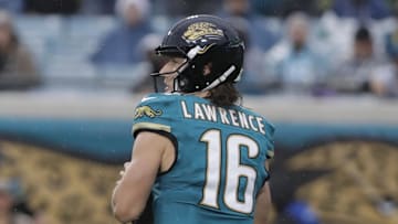 Dec 7, 2025; Jacksonville, Florida, USA;  Jacksonville Jaguars quarterback Trevor Lawrence (16) looks downfield against the Indianapolis Colts during the second half at EverBank Stadium. Mandatory Credit: Travis Register-Imagn Images