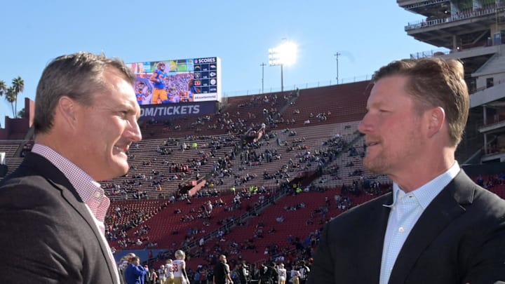 San Francisco 49ers general manager John Lynch (left) and Los Angeles Rams general manager Les Snead. Mandatory Credit: Kirby Lee-Imagn Images