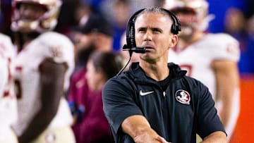 Florida State Seminoles head coach Mike Norvell looks to the replay screen at Steve Spurrier Field at Ben Hill Griffin Stadium in Gainesville, FL on Saturday, November 25, 2023 during the first half. [Doug Engle/Gainesville Sun]