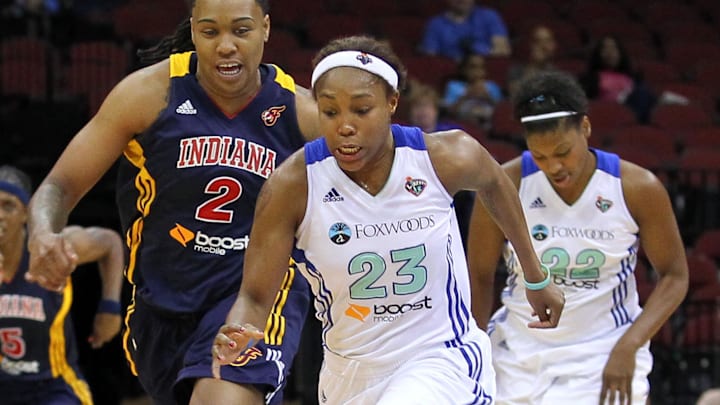 June 3, 2012; Newark, NJ, USA; New York Liberty guard Cappie Pondexter (23) steals the ball from Indiana Fever forward Eriana Larkins (2) during the first half at the Prudential Center. Mandatory Credit: Ed Mulholland-Imagn Images