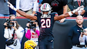 Nov 16, 2024; Columbia, South Carolina, USA; South Carolina Gamecocks defensive back Judge Collier (20) celebrates defending Missouri Tigers wide receiver Theo Wease Jr. (1) on a pass in the first quarter at Williams-Brice Stadium. Mandatory Credit: Jeff Blake-Imagn Images