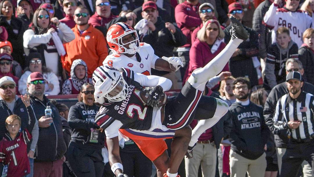 South Carolina defensive back Jalon Kilgore (24) intercepts a pass meant for Clemson running back Adam Randall (8) during the first quarter at Williams-Brice Stadium in Columbia, S.C. on Saturday, November 29, 2025.