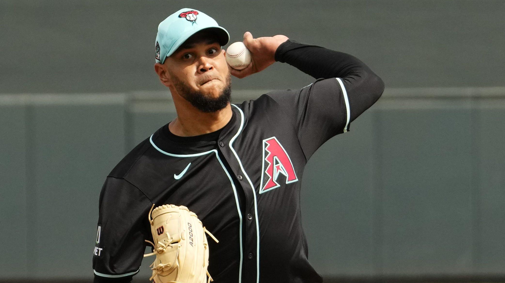 Arizona Diamondbacks left-hander Eduardo Rodriguez (57) pitches against the Texas Rangers at Salt River Fields.