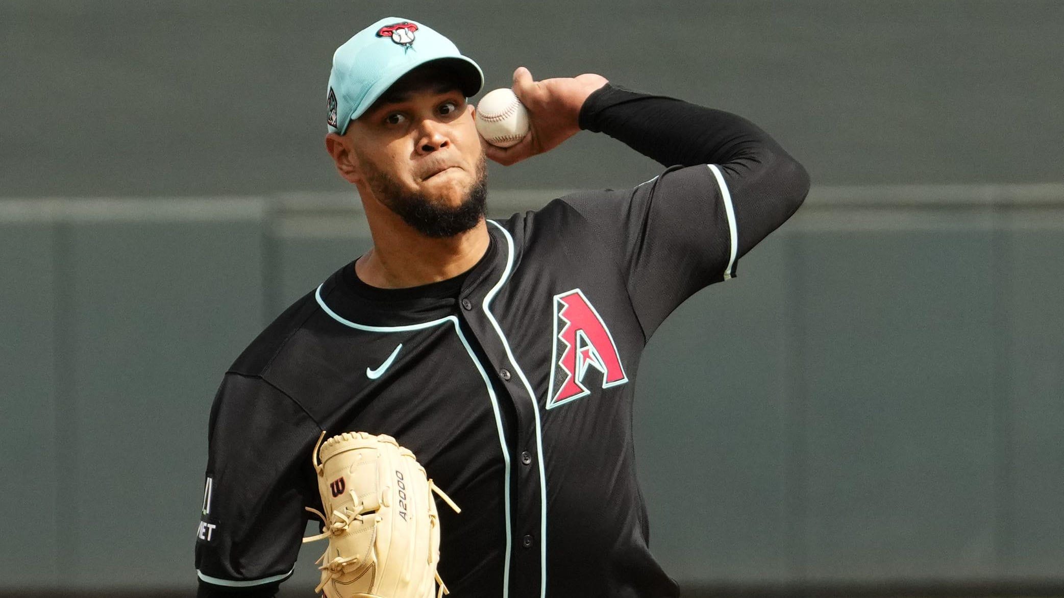 Arizona Diamondbacks left-hander Eduardo Rodriguez (57) pitches against the Texas Rangers at Salt River Fields.