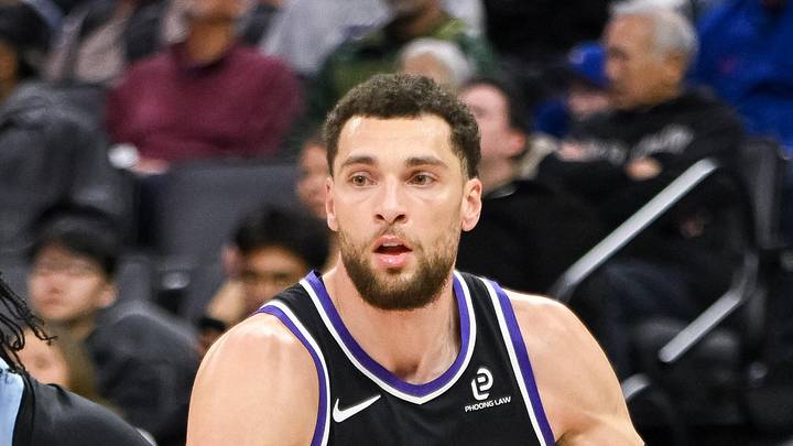 Feb 4, 2026; Sacramento, California, USA; Sacramento Kings guard Zach LaVine (8) dribbles past Memphis Grizzlies guard Kentavious Caldwell-Pope (3) during the third quarter at Golden 1 Center. Mandatory Credit: Ed Szczepanski-Imagn Images