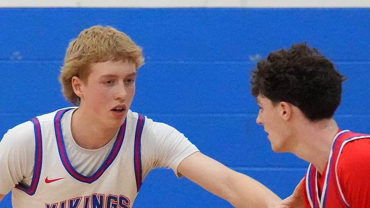 Wisconsin Lutheran's Kager Knueppel (1) guards Slinger's Jack Kohnen (3) during the game at Wisconsin Lutheran High School, in Milwaukee, Wisconsin, Dec. 9, 2025. Wisconsin Lutheran won the game, 68-46.
