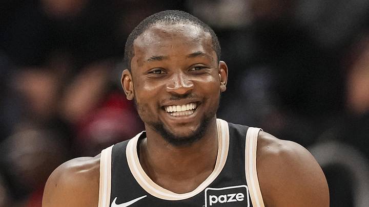 Atlanta Hawks forward Jonathan Kuminga (0) reacts after making a three point shot against the Washington Wizards during the first half at State Farm Arena on February 26, 2026. 