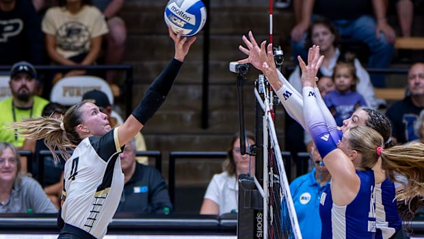 Purdue Junior Kenna Wollard (4) uses a touch shot 