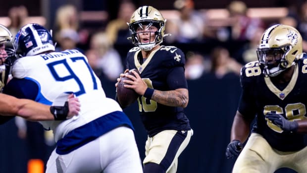 New Orleans Saints quarterback Spencer Rattler (18) looks downfield to pass against the Tennessee Titans 