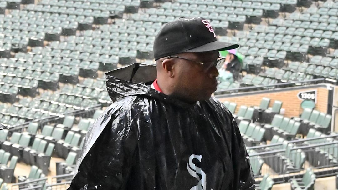 Jul 30, 2025; Chicago, Illinois, USA; Chicago White Sox fans walk upstairs in rain ponchos before a rain delay is announced prior to a game against the Philadelphia Phillies at Rate Field. Mandatory Credit: Patrick Gorski-Imagn Images