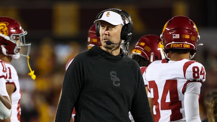 Oct 5, 2024; Minneapolis, Minnesota, USA; USC Trojans head coach Lincoln Riley looks on during the first half against the Minnesota Golden Gophers at Huntington Bank Stadium. Oct 5, 2024; Minneapolis, Minnesota, USA; USC Trojans head coach Lincoln Riley looks on during the first half against the Minnesota Golden Gophers at Huntington Bank Stadium.