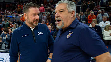 Ole Miss Rebels head coach Chris Beard and Auburn Tigers head coach Bruce Pearl talk before the game as Auburn Tigers takes on Ole Miss Rebels at Neville Arena in Auburn, Ala., on Saturday, Jan. 20, 2024.
