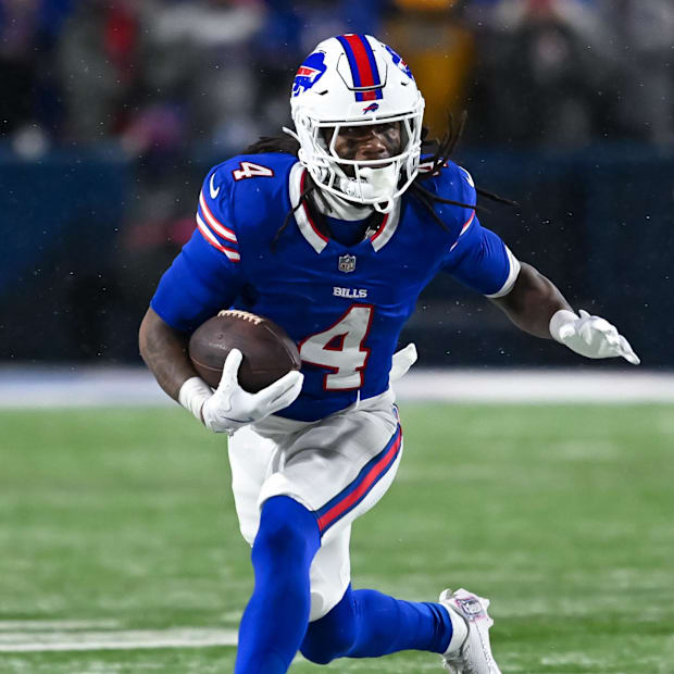 Buffalo Bills running back James Cook runs with the ball in the fourth quarter of an AFC divisional round game