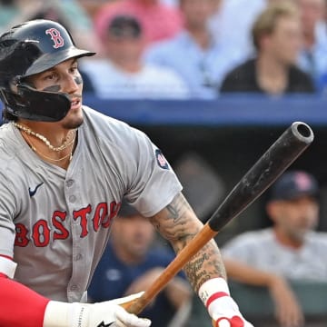 Boston Red Sox left fielder Jarren Duran (16) drives in a run with a fielders choice in the second inning against the Kansas City Royals at Kauffman Stadium on Aug 5.