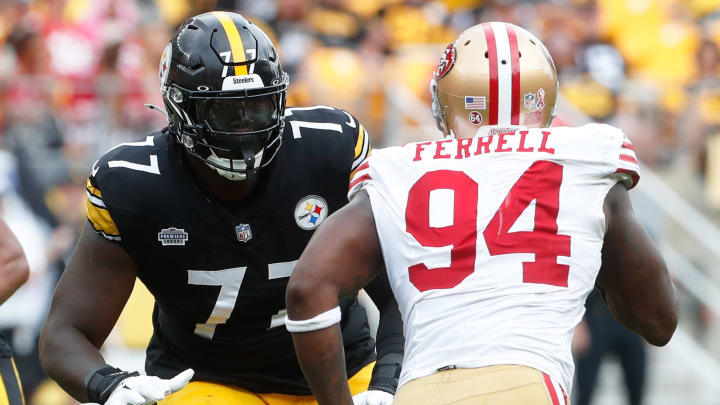 Sep 10, 2023; Pittsburgh, Pennsylvania, USA;  Pittsburgh Steelers offensive tackle Broderick Jones (77) blocks against San Francisco 49ers defensive end Clelin Ferrell (94) during the fourth quarter at Acrisure Stadium. Mandatory Credit: Charles LeClaire-USA TODAY Sports