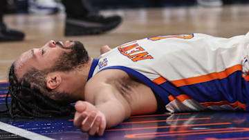 Dec 7, 2025; New York, New York, USA;  New York Knicks guard Jalen Brunson (11) lays on the court after getting fouled in the fourth quarter against the Orlando Magic at Madison Square Garden. Mandatory Credit: Wendell Cruz-Imagn Images