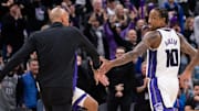 Jan 6, 2025; Sacramento, California, USA; Sacramento Kings head coach Doug Christie celebrates with forward DeMar DeRozan (10) in double overtime in the game against the Miami Heat at Golden 1 Center. Mandatory Credit: Ed Szczepanski-Imagn Images