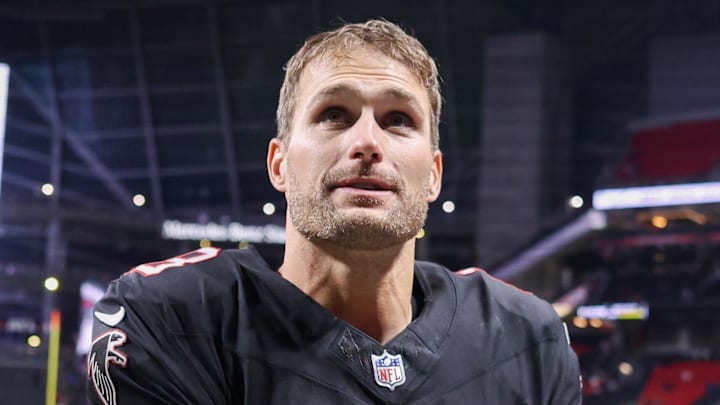 Former Atlanta Falcons quarterback Kirk Cousins celebrates after a victory over the Los Angeles Rams.