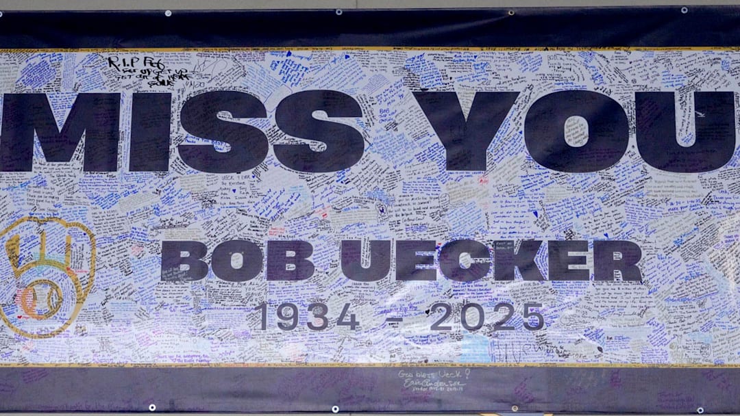 A banner honoring Bob Uecker is filled with signatures outside the press box, before the Milwaukee Brewers home opener against the Kansas City Royals at American Family Field in Milwaukee on Monday, March 31, 2025. - Mike De Sisti / Milwaukee Journal Sentinel