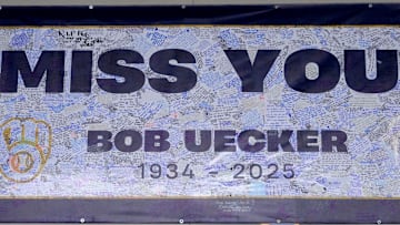 A banner honoring Bob Uecker is filled with signatures outside the press box, before the Milwaukee Brewers home opener against the Kansas City Royals at American Family Field in Milwaukee on Monday, March 31, 2025. - Mike De Sisti / Milwaukee Journal Sentinel