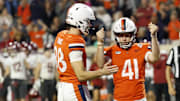 Oct 18, 2025; Charlottesville, Virginia, USA; Virginia Cavaliers kicker Will Bettridge (41) celebrates after making a game-tying field goal against the Washington State Cougars in the final minutes in the fourth quarter at Scott Stadium. Mandatory Credit: Geoff Burke-Imagn Images